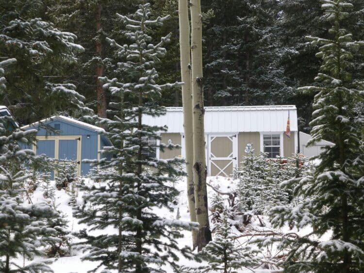 Home exterior surrounded by snow during a dry Colorado Springs winter